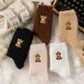 Chaussettes pelucheuses à vache des Highlands