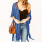 🌸🦋🌼 OFFRE LIMITÉE 55% DE RÉDUCTION! Poncho/Pareo Bohème en Maille Ajourée pour Femme – Ouverture Devant avec Pompons et Franges, Tissu Léger, Idéal pour les Jours Ensoleillés, les Vacances et le Quotidien Chic ✨🎶